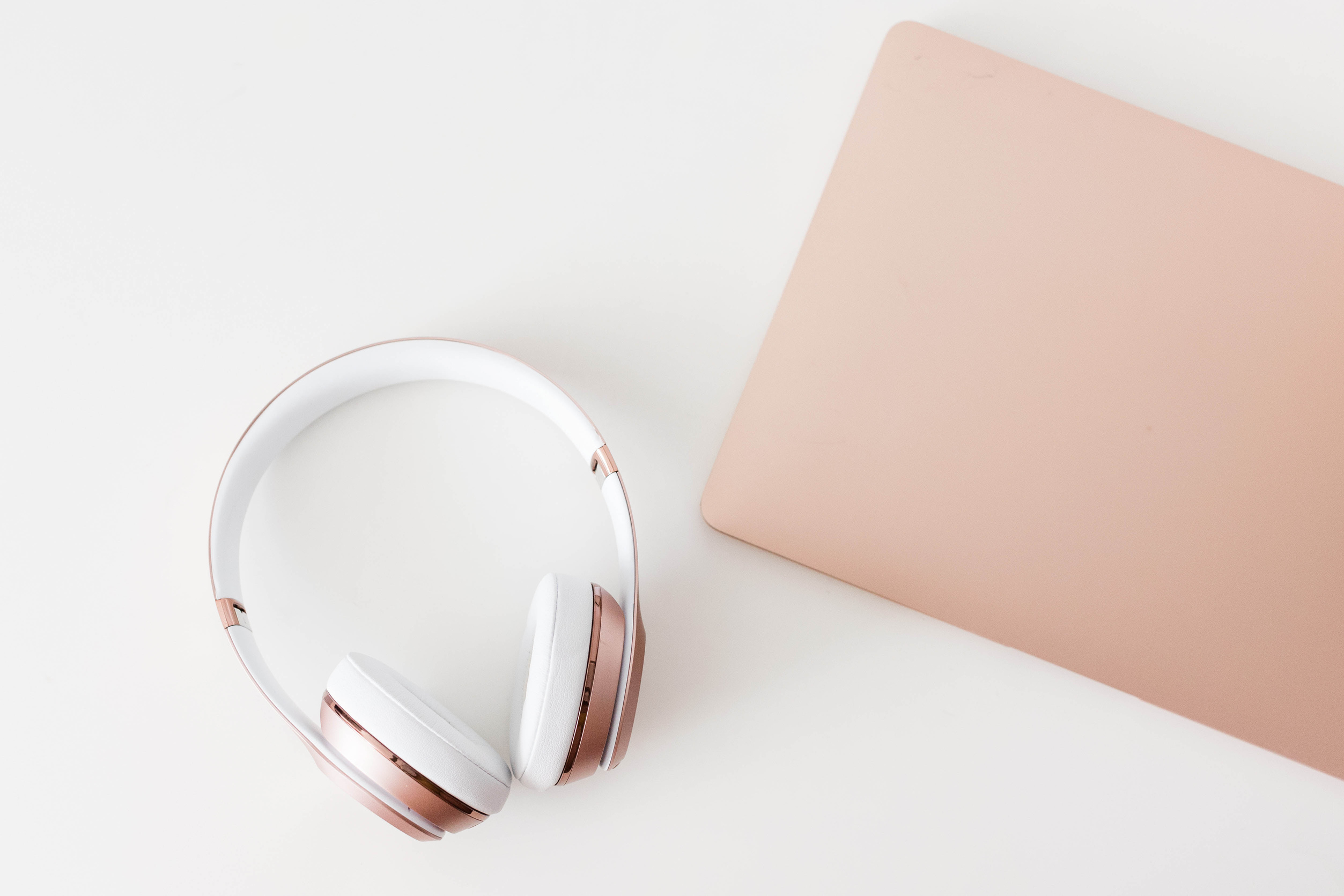 Headphones and Laptop for Podcasting